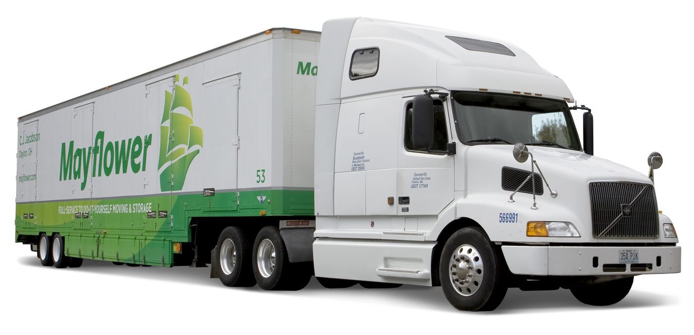 A Mayflower Transit semi-trailer moving truck photographed in 2010, shown in three-quarter view with the company's updated livery.